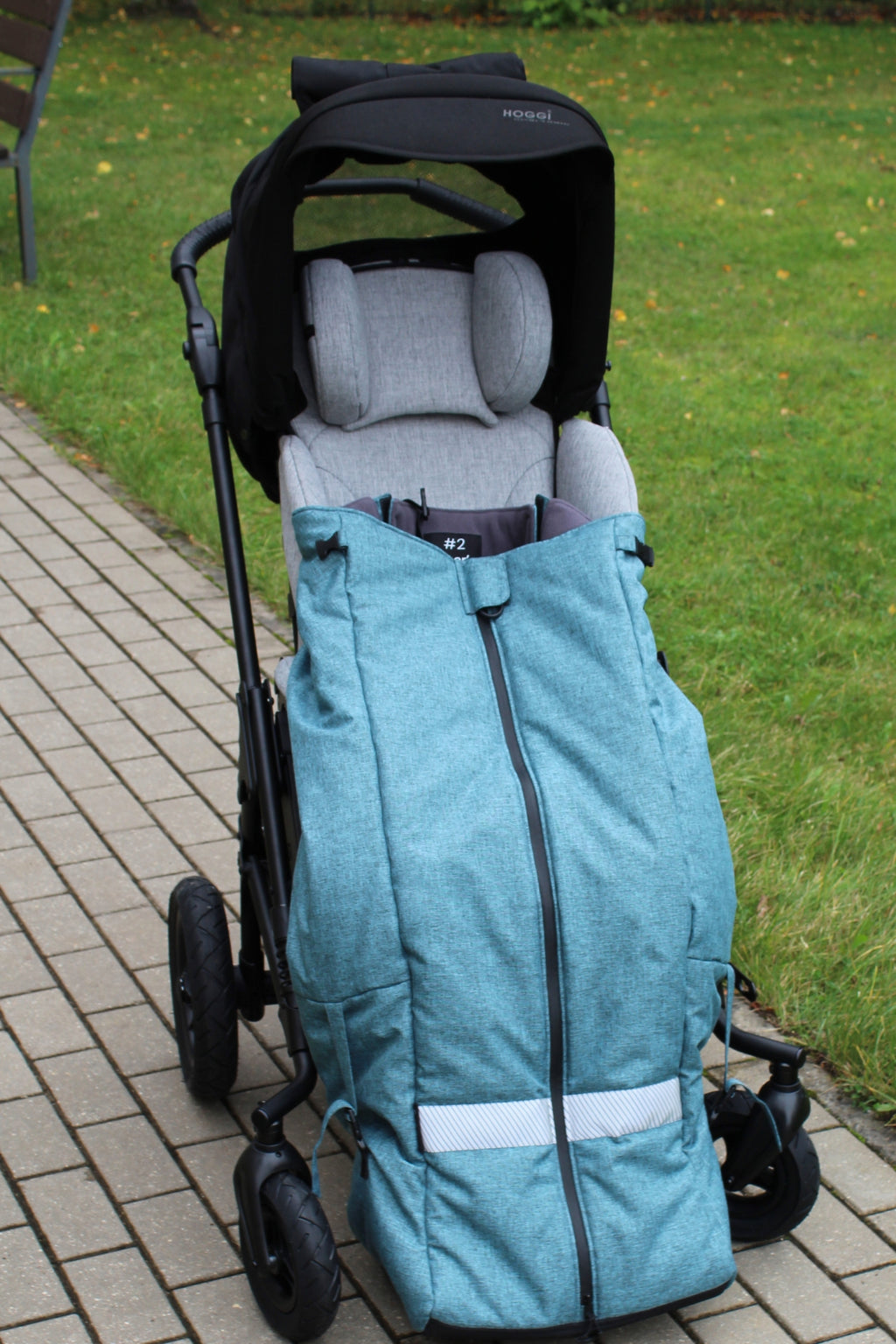 Junior. Geïsoleerde beenbedekking voor speciale-behoeften buggy's (Hoggi, Otto Bock)