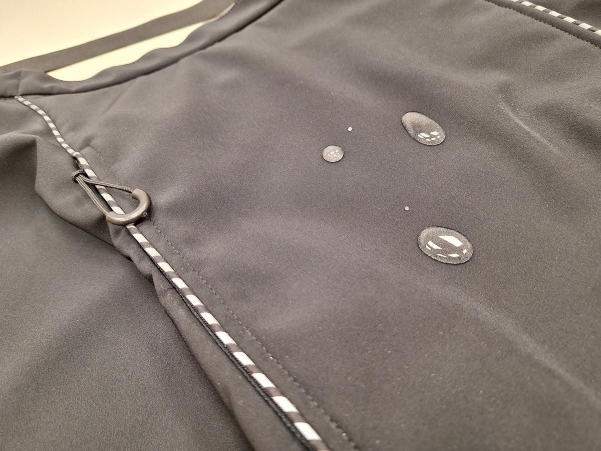 Rolstoeldeken met reflecterende elementen en magnetische sluiting