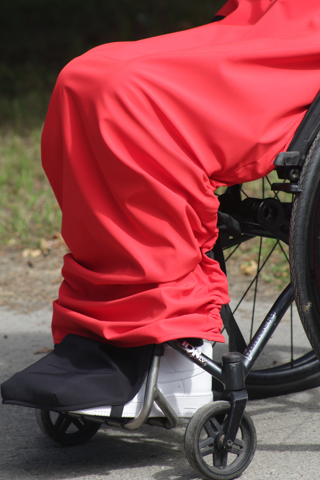 Rolstoel-adaptieve ademende verlengde regenjas